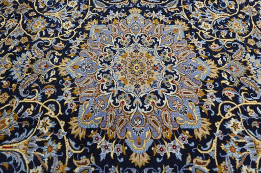 Central medallion detail of 2000s Kashan rug from Iran / Persia