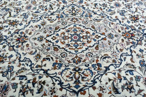 Central medallion detail of 2000s Kashan rug from Iran / Persia