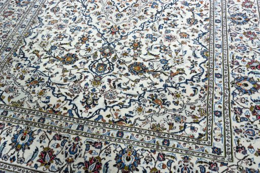 Close-up detail of 2000s Kashan rug from Iran / Persia showing Wool weave