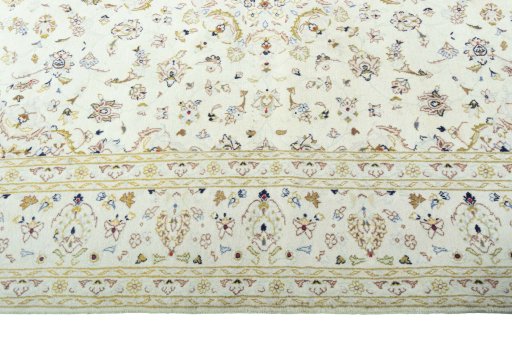 Corner detail of New Kashan rug showing border pattern and Wool pile