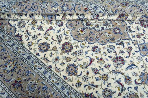 Close-up detail of 2000s Kashan rug from Iran / Persia showing Wool weave