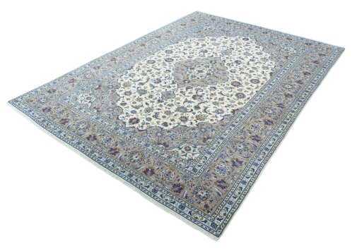 Corner detail of 2000s Kashan rug showing border pattern and Wool pile