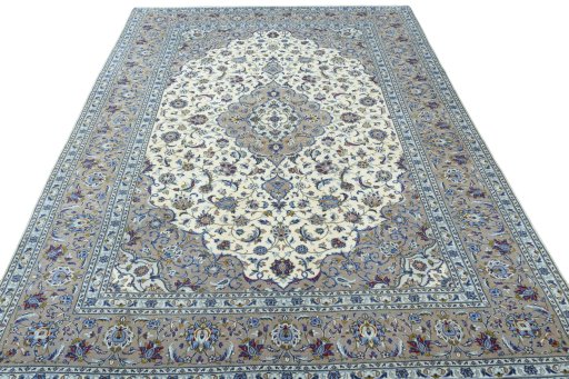 Surface texture of 2000s Kashan rug with natural Wool and intricate pattern