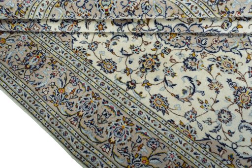 Close-up detail of 2000s Kashan rug from Iran / Persia showing Wool weave
