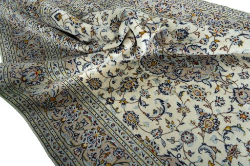 Surface texture of 2000s Kashan rug with natural Wool and intricate pattern