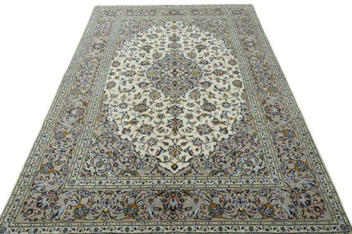 Surface texture of 2000s Kashan rug with natural Wool and intricate pattern