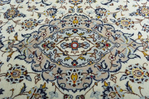 Central medallion detail of 2000s Kashan rug from Iran / Persia