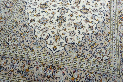 Close-up detail of 2000s Kashan rug from Iran / Persia showing Wool weave