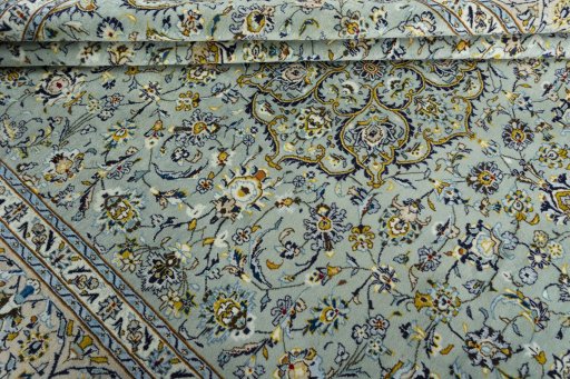 Close-up detail of 2000s Kashan rug from Iran / Persia showing Wool weave