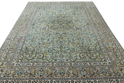 Surface texture of 2000s Kashan rug with natural Wool and intricate pattern