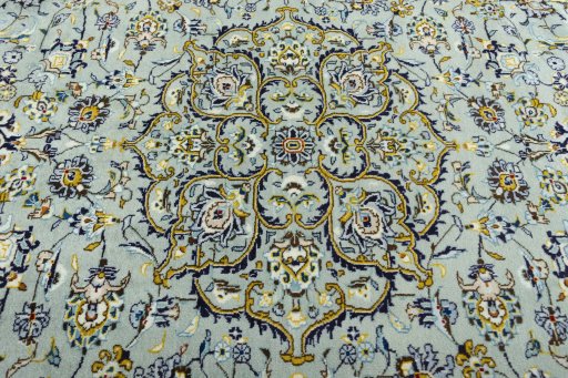 Central medallion detail of 2000s Kashan rug from Iran / Persia