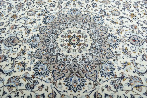 Central medallion detail of 2000s Kashan rug from Iran / Persia