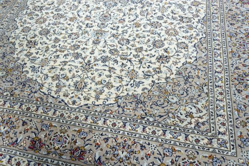 Close-up detail of 2000s Kashan rug from Iran / Persia showing Wool weave