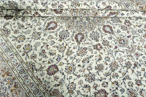 Close-up detail of 2000s Kashan rug from Iran / Persia showing Wool weave