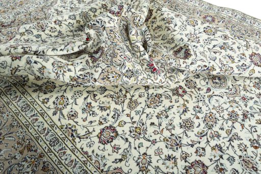 Surface texture of 2000s Kashan rug with natural Wool and intricate pattern