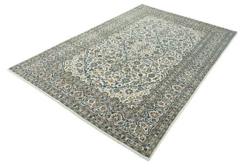 Corner detail of 2000s Kashan rug showing border pattern and Wool pile