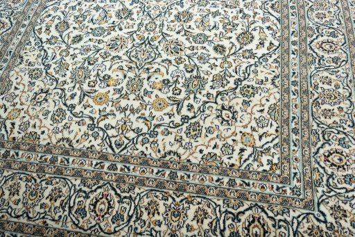Close-up detail of 2000s Kashan rug from Iran / Persia showing Wool weave