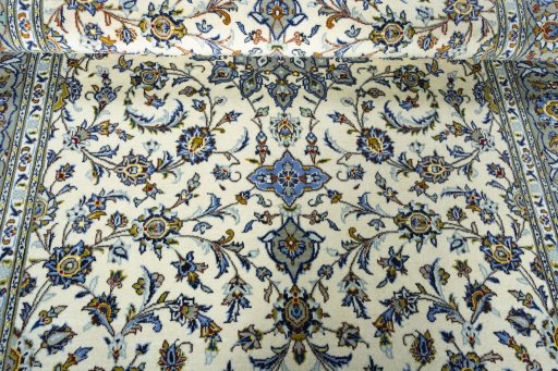 Close-up detail of 2000s Kashan rug from Iran / Persia showing Wool weave