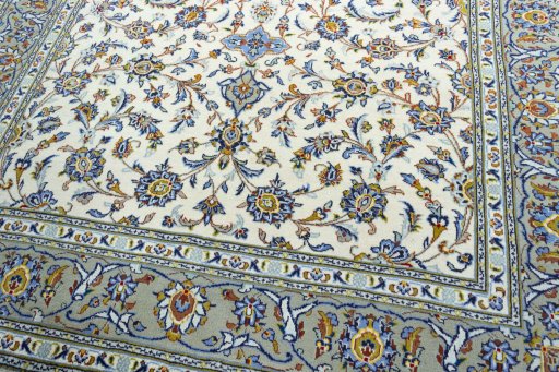 Close-up detail of 2000s Kashan rug from Iran / Persia showing Wool weave