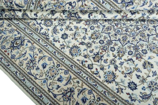 Close-up detail of 2000s Kashan rug from Iran / Persia showing Wool weave