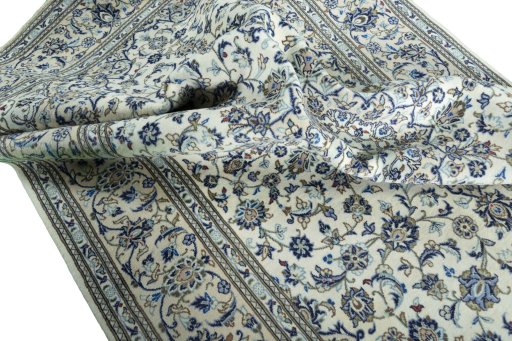 Surface texture of 2000s Kashan rug with natural Wool and intricate pattern