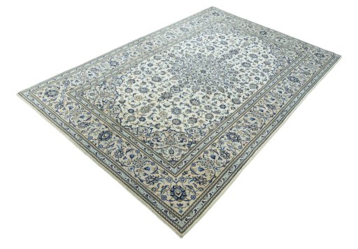 Corner detail of 2000s Kashan rug showing border pattern and Wool pile