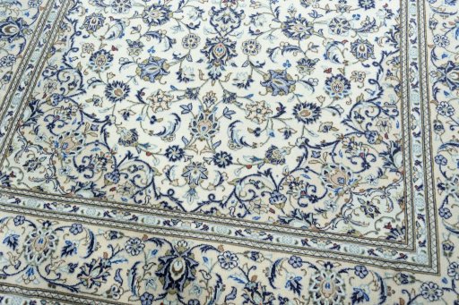 Close-up detail of 2000s Kashan rug from Iran / Persia showing Wool weave
