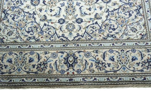 Full view of 2000s Kashan rug from Iran / Persia, 303 × 202 cm in Beige tones