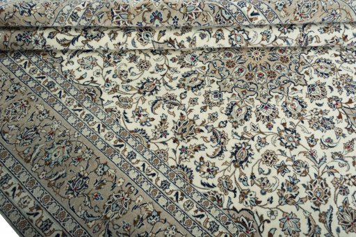 Close-up detail of 2000s Kashan rug from Iran / Persia showing Wool weave