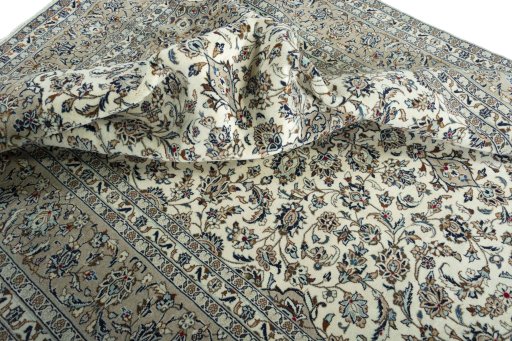 Surface texture of 2000s Kashan rug with natural Wool and intricate pattern