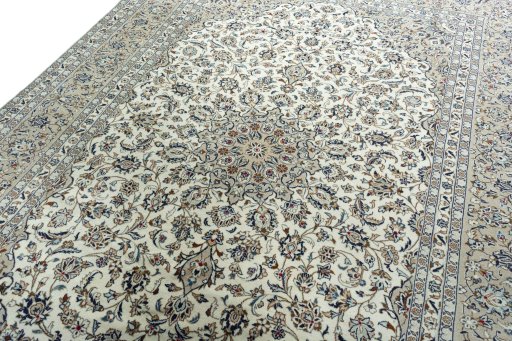 Backside of handmade 2000s Kashan rug showing knot structure and weave density