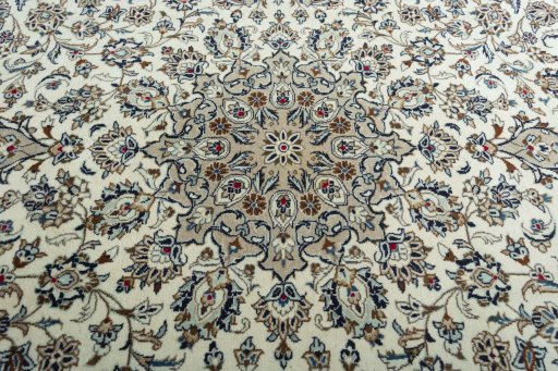 Central medallion detail of 2000s Kashan rug from Iran / Persia