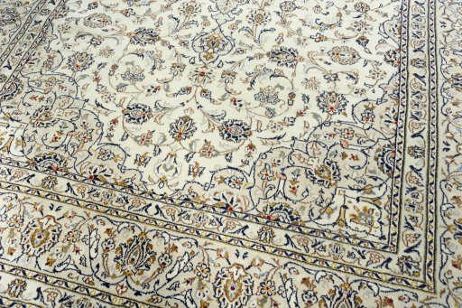 Close-up detail of 2000s Kashan rug from Iran / Persia showing Wool weave
