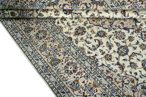 Close-up detail of 2000s Kashan rug from Iran / Persia showing Wool weave