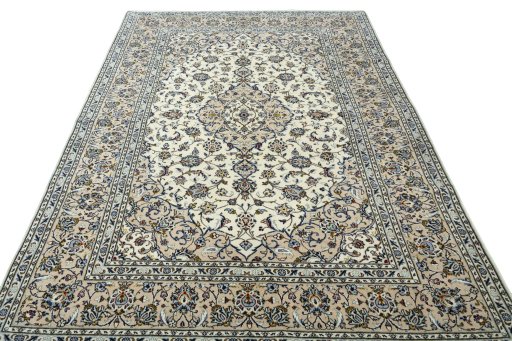 Surface texture of 2000s Kashan rug with natural Wool and intricate pattern
