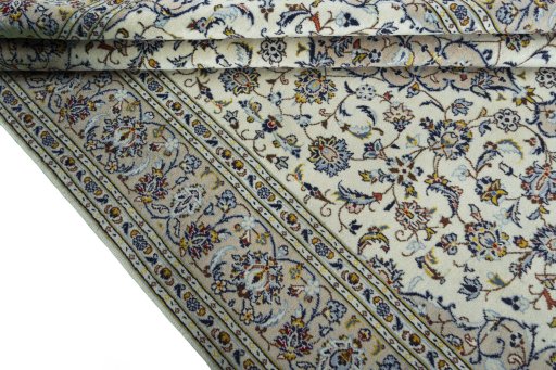 Close-up detail of 2000s Kashan rug from Iran / Persia showing Wool weave
