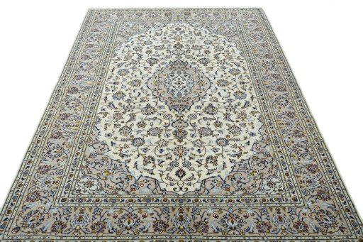 Surface texture of 2000s Kashan rug with natural Wool and intricate pattern