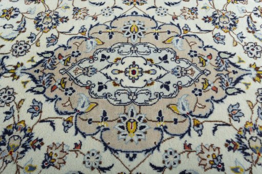 Central medallion detail of 2000s Kashan rug from Iran / Persia