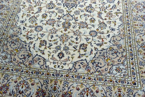 Close-up detail of 2000s Kashan rug from Iran / Persia showing Wool weave