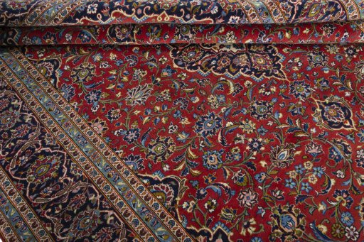 Close-up detail of 2000s Kashan rug from Iran / Persia showing Cork weave