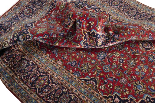 Surface texture of 2000s Kashan rug with natural Cork and intricate pattern