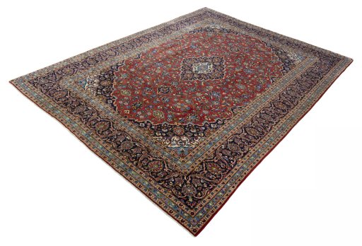 Corner detail of 2000s Kashan rug showing border pattern and Cork pile