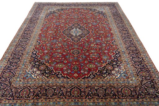 Surface texture of 2000s Kashan rug with natural Cork and intricate pattern