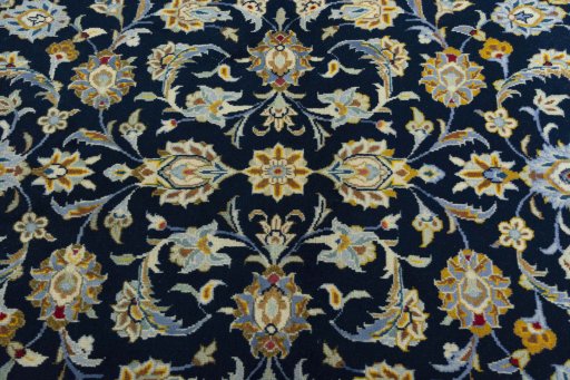 Central medallion detail of 2000s Kashan rug from Iran / Persia