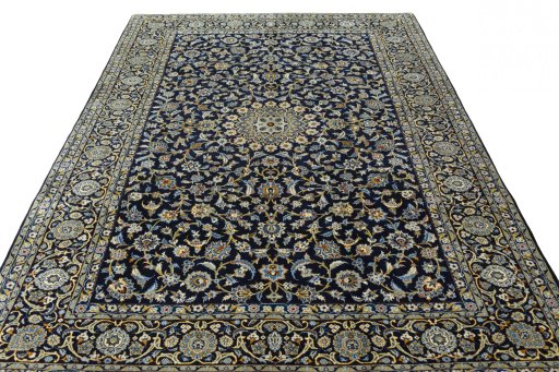 Surface texture of 2000s Kashan rug with natural Wool and intricate pattern