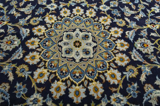 Central medallion detail of 2000s Kashan rug from Iran / Persia
