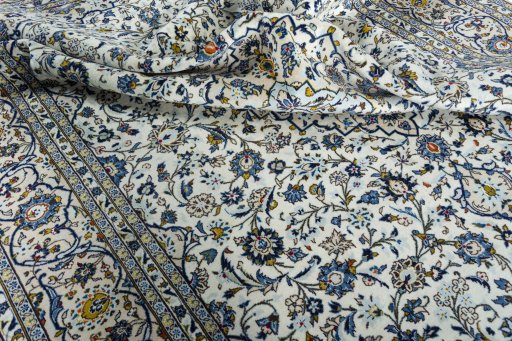 Surface texture of 2000s Kashan rug with natural Wool and intricate pattern