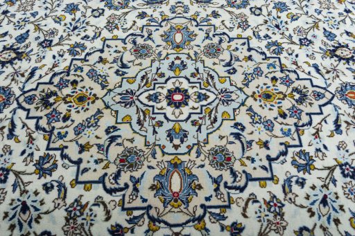 Central medallion detail of 2000s Kashan rug from Iran / Persia