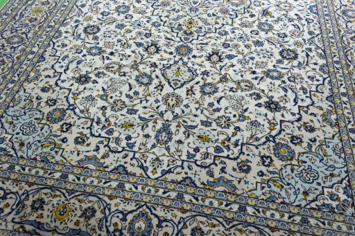 Close-up detail of 2000s Kashan rug from Iran / Persia showing Wool weave