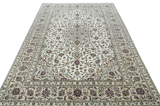 Surface texture of 2000s Kashan rug with natural Wool and intricate pattern